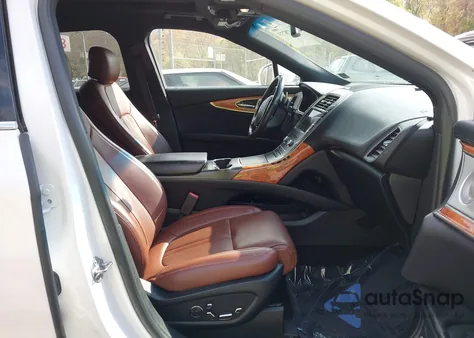 2019 Lincoln Nautilus Reserve from USA, damaged, VIN 2LMPJ8LP6KBL10920